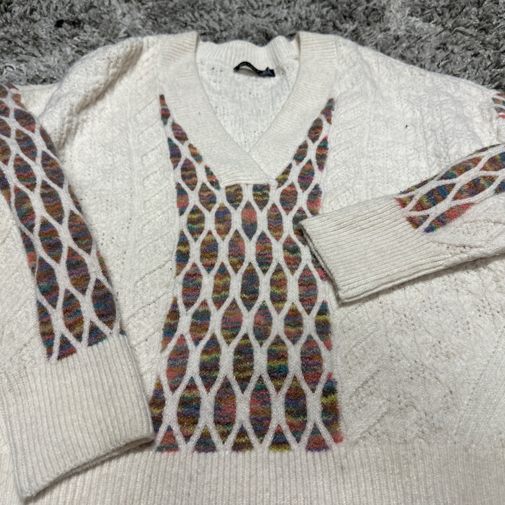 Black tape knit sweater
